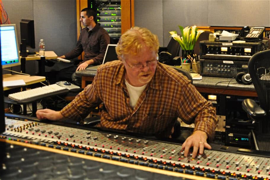 Doug Rider is sitting behind a large Neve console at Capitol Studio B in Hollywood CA